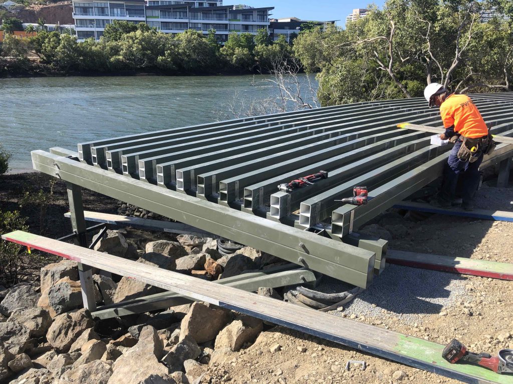PW landscape installing pedestrian boardwalk in Townsville over sensitive mangrove area around the Ross River 
