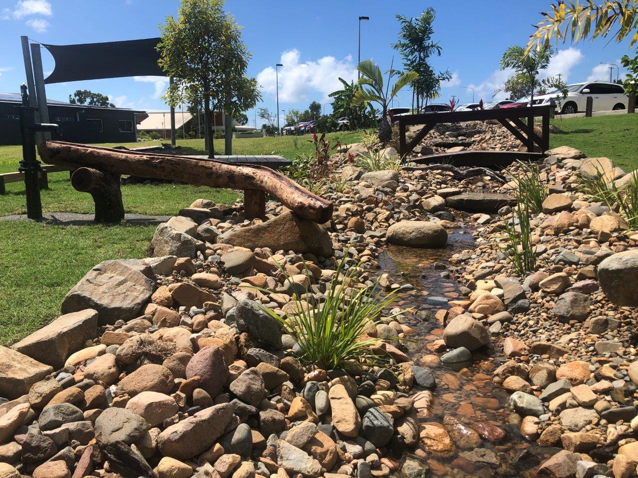 recirculating creek school learning spaces by North Queensland Landscaping Team PW Landscapes